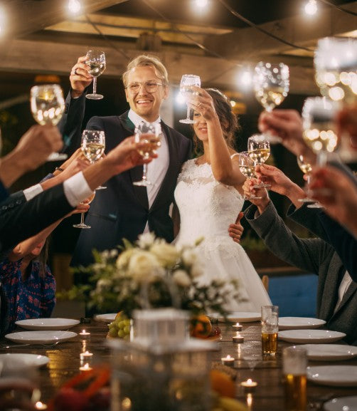 Newly-wed couple raising a toast with wine from Wine Network